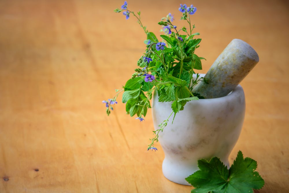 Natural herbs and mortar used in naturopathy for diabetes management